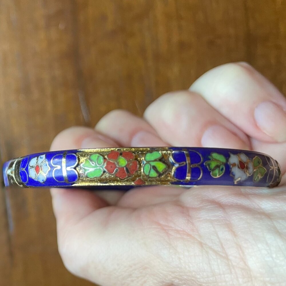Blue, red, gold, green and white cloisonne bracelet with hidden clasp.